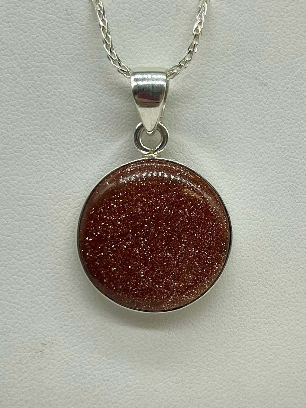 Round Goldstone Pendant