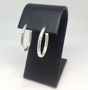 Oval Diamond-Cut Silver Hoop Earrings